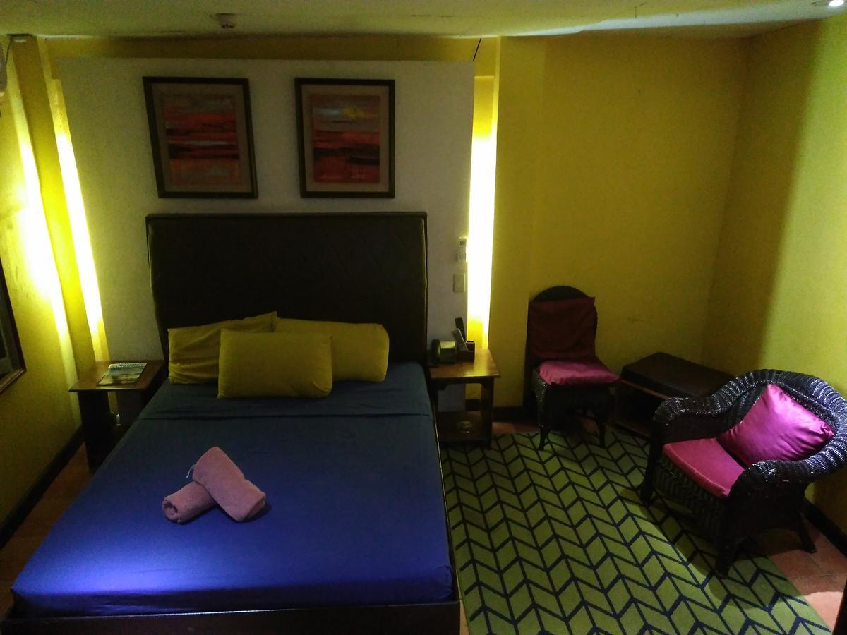 แมงโกส บีชฟรอนต์ รีสอร์ต Hotel โอลองกาโป ห้อง รูปภาพ