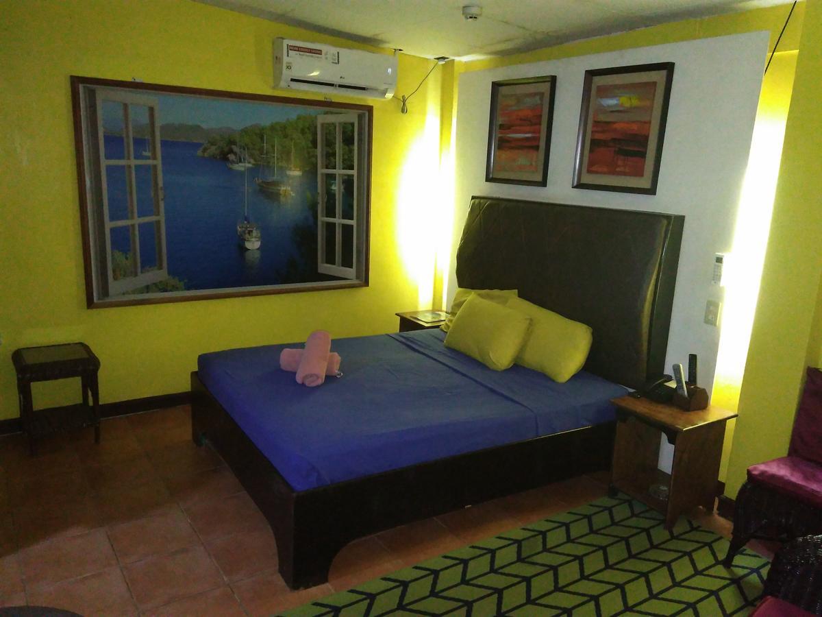 แมงโกส บีชฟรอนต์ รีสอร์ต Hotel โอลองกาโป ห้อง รูปภาพ